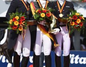 The Grand Prix Special podium: Dorothee Schneider, Isabell Werth, Kristina Sprehe