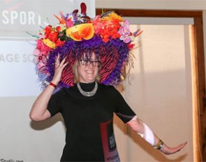Angel Gunn models her winning Carmen Miranda inspired hat at the competitors' banquet.
