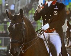 Carl Hester flashes his team silver to the fans