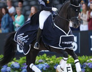 Dorothee Schneider and Sezuan win the 7-year old division at the 2016 World Young Horse Championships :: Photo © Astrid Appels