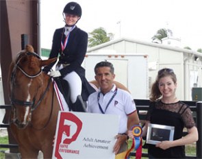 Signe Kirk Kristiansen was honored with the Piaffe Performance Adult Amateur Achievement Award presented by Dr. Cesar Parra (middle) at the Adequan Global Dressage Festival 