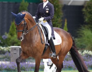Olivia Lagoy-Weltz on Rassing's Lonoir. Not as on point as in the Rotterdam Grand Prix with a trailing right hind in the piaffe and swaying tempi changes, but the trot half passes and extensions were fabulous