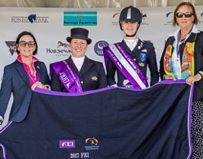 Australian judge Jane Ventura with the Intermediaire I place-getters Stephanie McDonald and Jamie Mita at the FEI World Dressage Challenge at the 2017 CDI-W Boneo