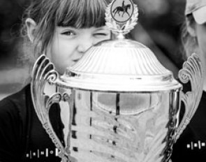 Small kid, big trophy