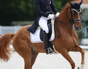 French Jean Philippe Siat and Marie-Christine Pointier's 10-year old Hanoverian mare Lovesong (by Locksley II x Wolkenstein II)