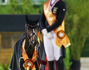 Carlos looks at his gold medal winning rider, Hannah Erbe