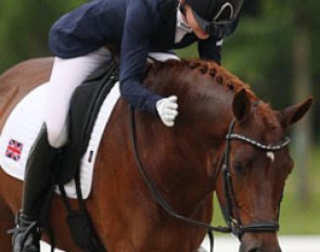 Charlotte McDowall pats Le Chiffre