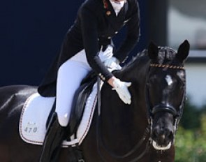 Semmieke Rothenberger gives Geisha a big pat at the end of their ride