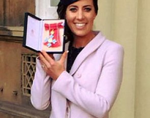 Charlotte Dujardin with her MBE medal at Buckingham Palace