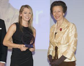 Young Rider Charlotte Fry receives the Under 25 Star of the Future Award from Princess Anne at the 2017 AHT UK Equestrian Awards gala in London