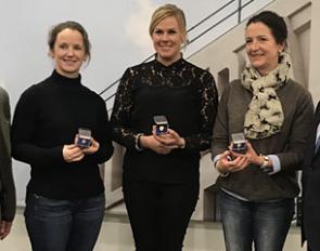 Judy Reynolds, Heike Holstein, Anna Merveldt, receiving their FEI Badges of Honour at the 2017 CDI-W London