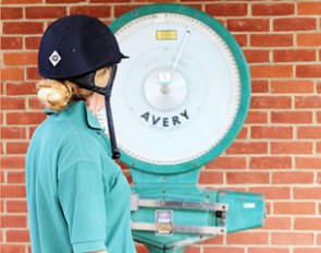 Rider on the scales as part of the Animal Health Trust study on rider weight
