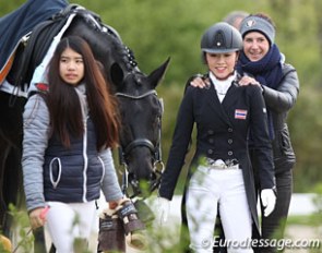 Johanna von Fircks gives Ravisara Wachakorn a pat on the back after her test