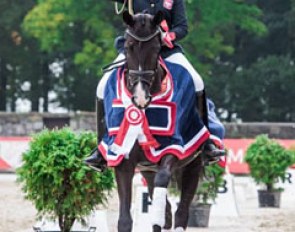 Zaneta Skowronska on Victory at the 2017 Polish Young Horse Championships :: Photo © Lukasz Kowalski