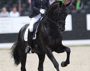 Charlotte Fry and Don Joe (by Diego x Lord Leatherdale) braving the first bit of rain of the day