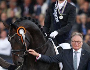 Andreas Helgstrand and Ferrari win silver, show director and FEI Dressage Committee chair Frank Kemperman flanks them