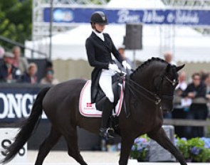Louise Lind on Trine Lind's Danish gelding Jubi's Tenacity (by Temptation x Don Schufro). The walk was a real highlight but in trot and canter, the black lacks suppleness and carrying power which can be developed over time