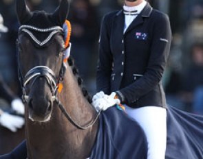 A beaming Simone Pearce on Feodoro during the prize giving ceremony
