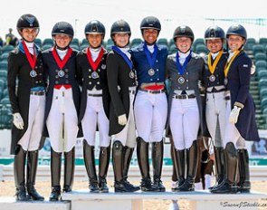 USA Team A, USA Team B, and Team Canada pose together atop the podium after receiving their medals in the inaugural FEI Under 25 Nations Cup CDIO 3* Wellington :: Photo © Sue Stickle