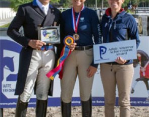 Dr. Cesar Parra (left) and Katie Riley (right) of Piaffe Performance present rider Kelly Parsons (center) with the Piaffe Performance Adult Amateur Achievement Award at the Adequan Global Dressage Festival