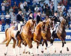 The 1994 WEG bronze medal U.S. team: Robert Dover on Devereaux, Kathleen Raine on Avontuur, Carol Lavell on Gifted, and Gary Rockwell on Suna :: Photo © Mary Phelps