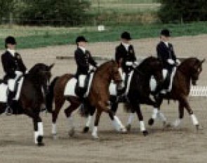 The Belgian team riding their winning Kur to Music