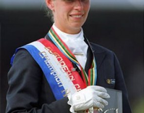 The gold medal and a trophy for Anky van Grunsven at the 1999 European Championship