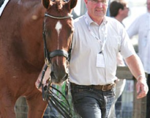 Part-Owner Henk Koers walks Parzival after Adelinde's gold medal winning Grand Prix Special ride at the 2009 European Championships :: Photo © Astrid Appels