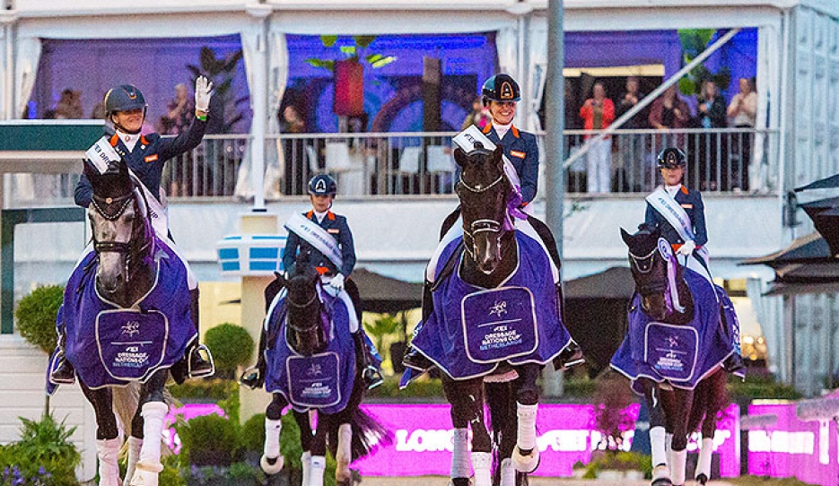 The lap of honour,  from left to right - Thamar Zweistra and Hexagon’s Ich Weiss, Lynne Maas and Eastpoint, Emmelie Scholtens and Indian Rock, and Dinja van Liere with Hermes of the Netherlands - winners of the FEI Dressage Nations Cup 2022 - Rotterdam :: Photo © Shannon Brinkman