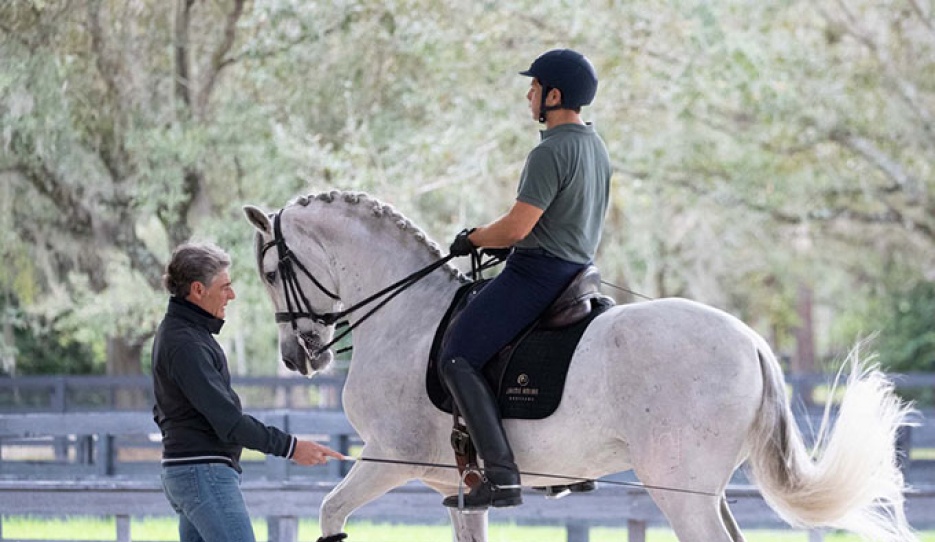 Spanish Olympian Juan Manuel Munoz coaching Jaime Amian on a PRE in one of two clinics during 2023 USPRE Week :: Photo © Lily Forado