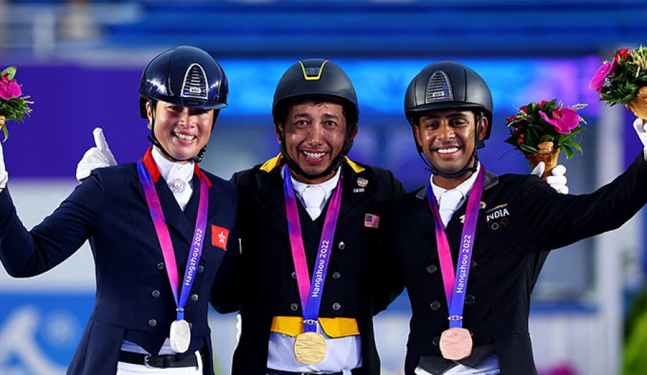 jacqueline Siu, Qabil Ambak and Anush Agarwalla on the individual podium at the 2023 Asian Games :: Photo © FEI