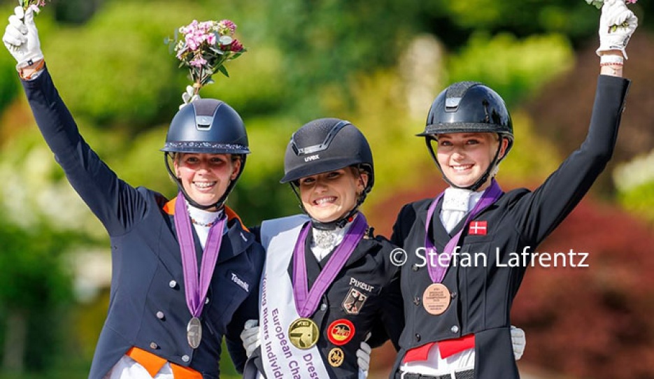 Anniek van Dulst, Lana-Pinou Baumgurtel and Anna Teibel Raben on the individual test podium at the 2025 European Young Riders Championships :: Photo © Stefan Lafrentz