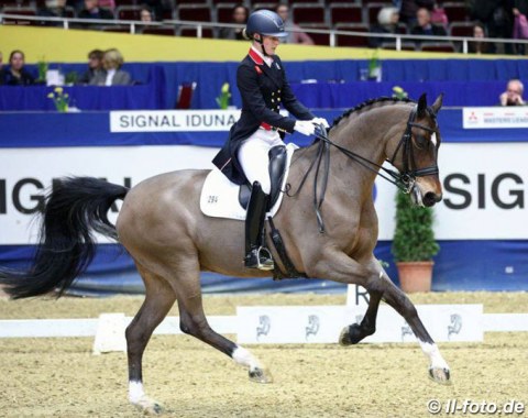 Lara Butler on Rubin al Asad (by Rubin Royal).  The horse had good bounce in passage, the extended walk had decent overtrack although the rhythm was not the clearest. In piaffe he did not really take the weight on the hindquarters, but Griffith kept a steady rhythm going.