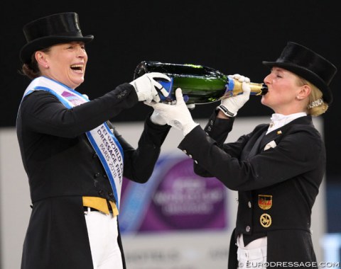 Werth shared her champagne with Graves and Von Bredow-Werndl (here) as well as with the grooms of the top three ranked horses