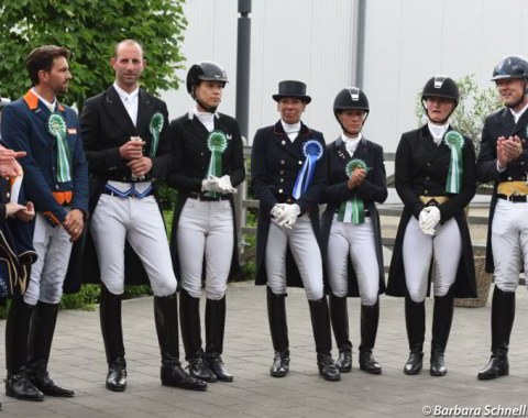 Grand Prix riders lined up: Tommie Visser, Eyal Zlatin, Briana Burgess, Stephanie Brieussel, Fanny Verliefden, Trine Mittag Jensen, Christian Zimmermann-Bruehe