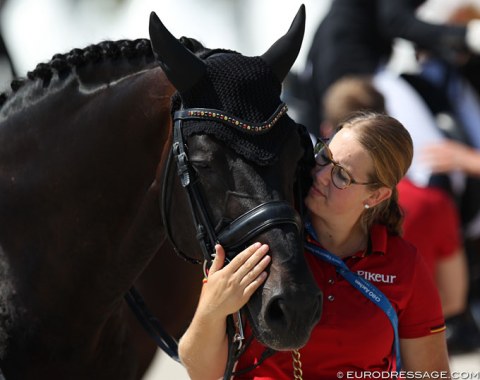 Groom Ann-Christin de Boer cuddles with Damsey