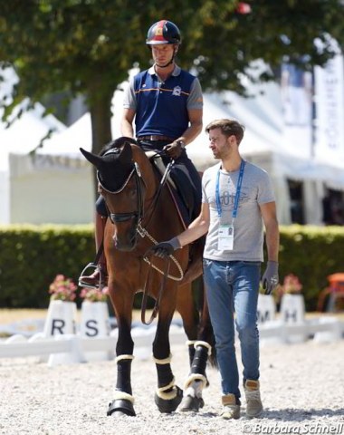 Spanish Grand Prix rider Borja Carrascosa on Die Furstin, flanked by his life and business partner Alexander Brenninkmeijer