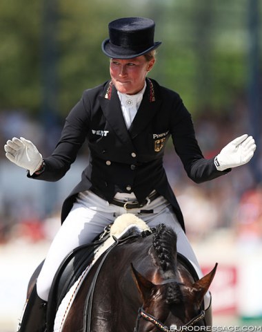 Helen Langehanenberg looks at her team upon leaving the arena and while waiting for her score to pop on the board