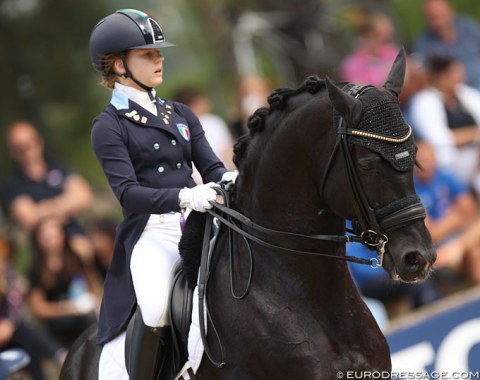 Seasoned Italian competitor Alice Campanella on Chin Chan K. The black stallion struggled with regularity issues in trot today and Campanella did her best to make the most out of it. 