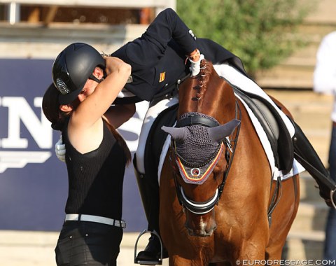 Juan Jose Gonzalez de las Cuevas hugs his coach Maya Pou