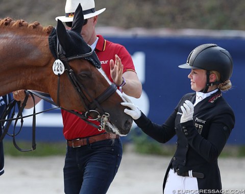 Paulina Holzknecht pats Wells Fargo right before the medal ceremony