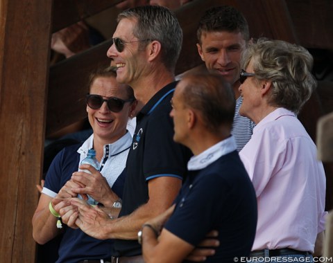 Müller's trainer Isabell Werth and home coach Götz Brinkmann