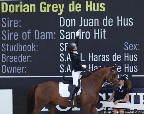 Jessica then turns round and points her finger at Don Juan's name on the board