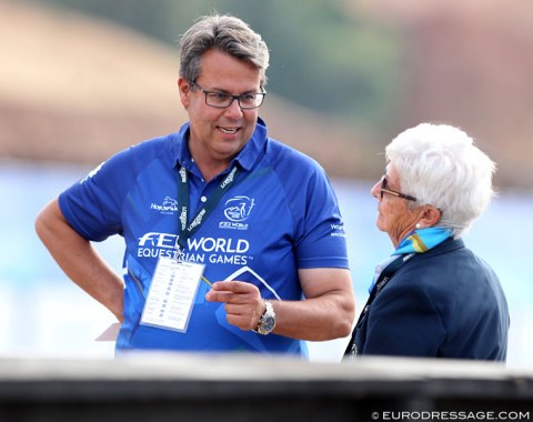 WEG Dressage director Thomas Baur chatting with retired judge Cara Whitham