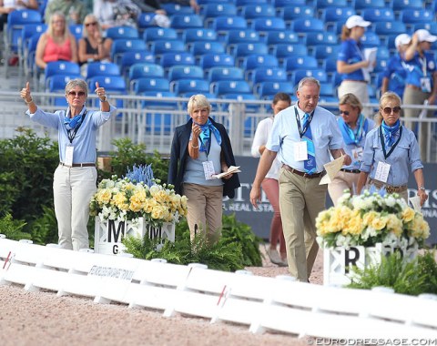 Judge Susan Hoevenaars gives a thumbs' up to indicate that all systems are go to begin the Grand Prix class after the guinea pig rode