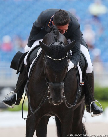 Severo Jurado Lopez pats Deep Impact