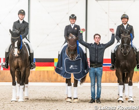 Danish trainer Dennis Fisker in between Farbrot and Ambak