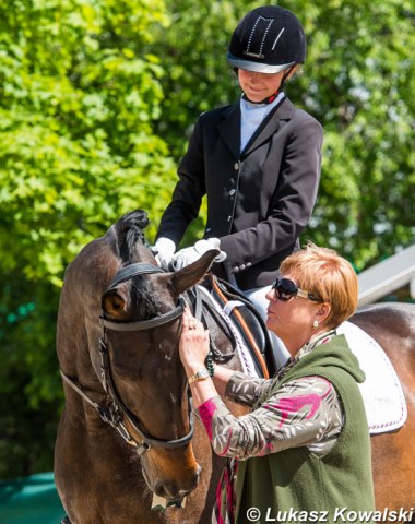 Judge Sissy Max-Theurer pats Marie Lumbachova's Colinda