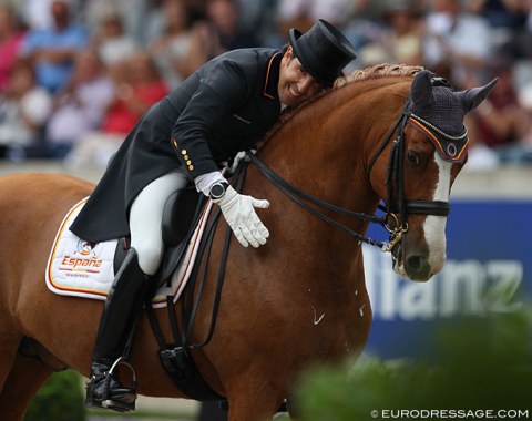 Claudio Castilla Ruiz pats his Lusitano Alcaide