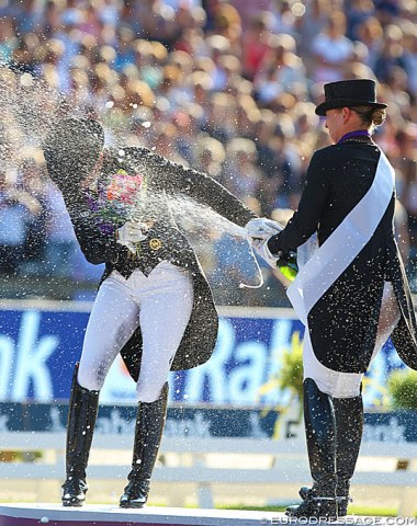 Isabell Werth gives Dorothee Schneider a champagne shower